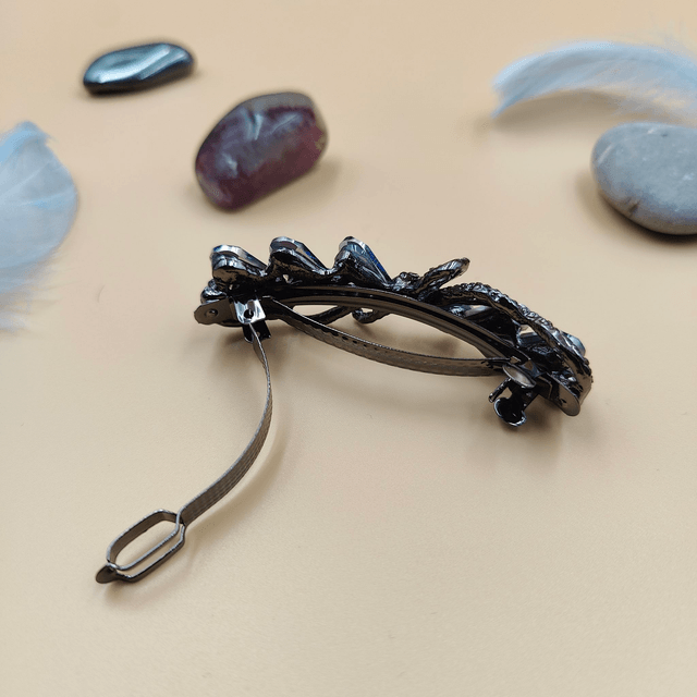 Barrette noire en forme de nœud avec strass bleus - Accessoire élégant et raffiné pour cheveux