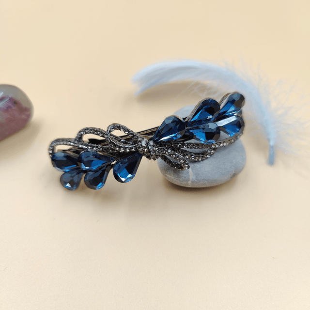 Barrette noire en forme de nœud avec strass bleus - Accessoire élégant et raffiné pour cheveux