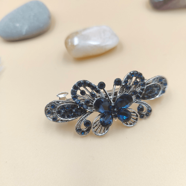 Barrette noire en forme de papillon avec strass bleus - Accessoire élégant et raffiné pour cheveux